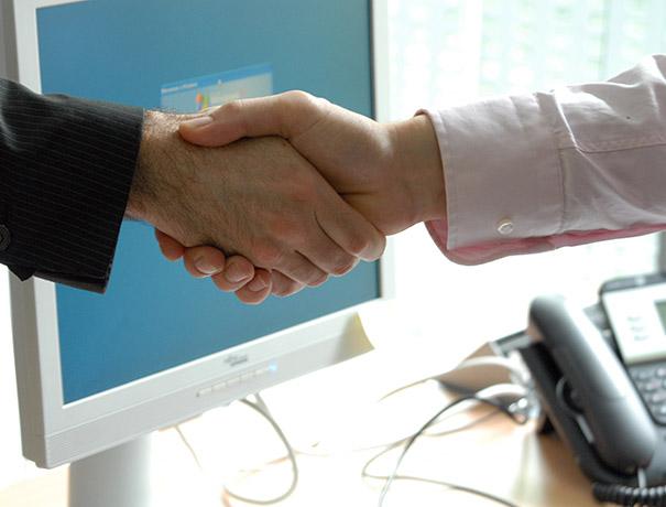 Handshake between employer and employee