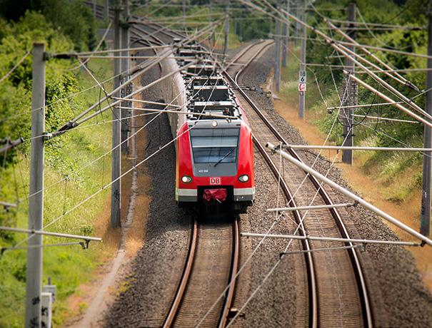 Train on tracks, photo by Thomas B. from Pixabay